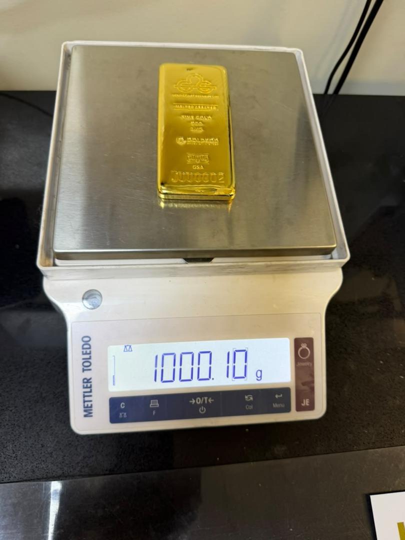 Gold bar on a digital weighing scale